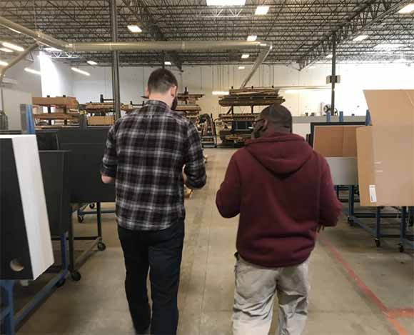 Cody and Charles Walking in Formaspace's Manufacturing Facility