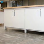 IT Innovation Lab with Island Table and Lockable Storage