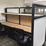 modular cubicles with storage shelves and whiteboards