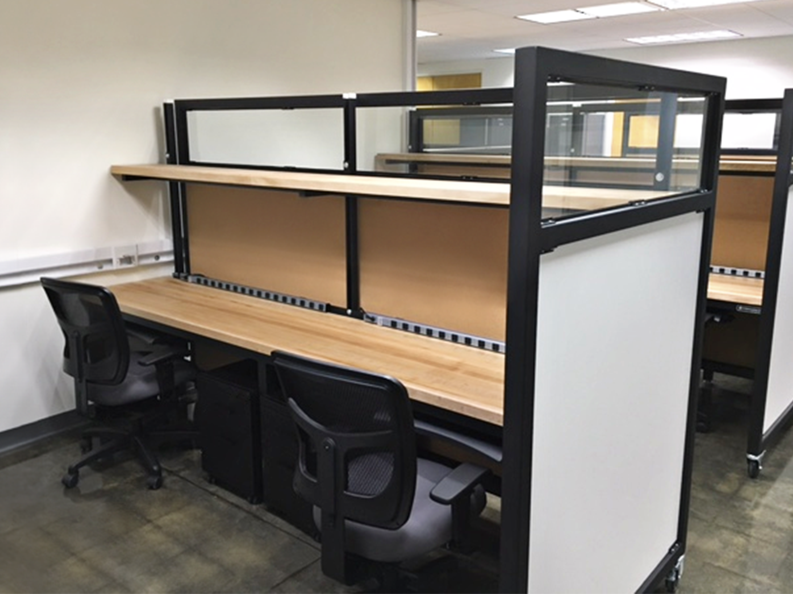 modular cubicles with storage shelves and whiteboards