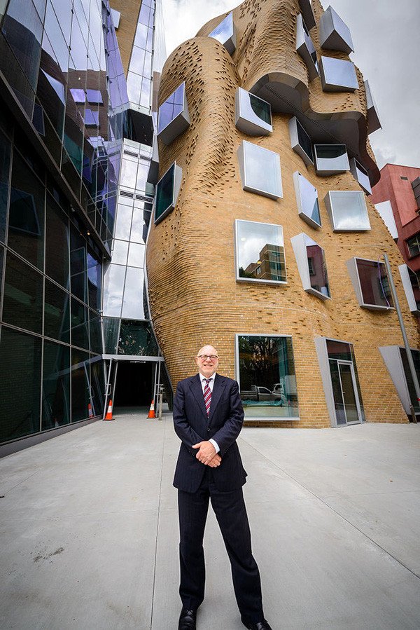 Professor Roy Green stands in front of the new Frank Gehry designed Dr Chau Chak Building in Sydney.